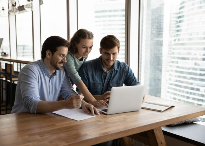 Creative,Business,Team,Sharing,Laptop,In,Office,,Watching,Startup,Presentation,